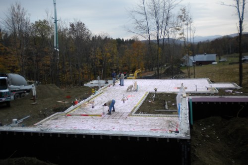 first floor laid out during new home build project in central vermont as allied contractors measure the site