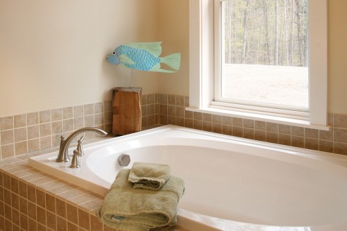 Bathroom tub and green efficient window in central vermont home build project by allied contractors