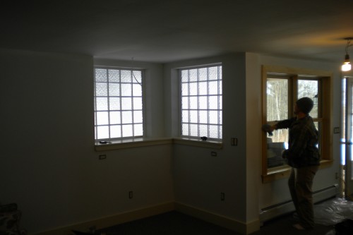 two bright green efficient windows in waterbury vermont basement after completion of remodeling project by allied contractors