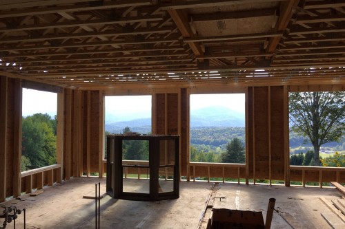 A work in progress shot of a living area during a full remodel process of a central vermont farmhouse
