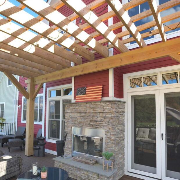 back deck featuring an outdoor fireplace