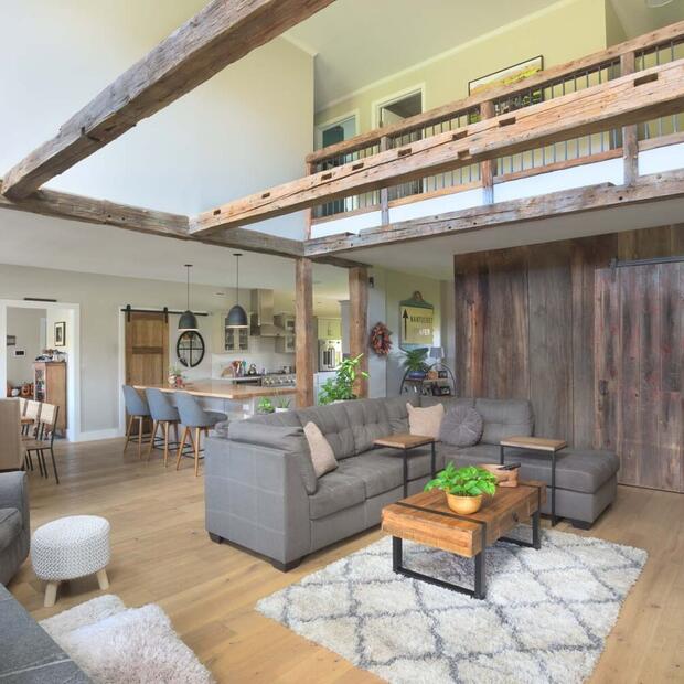 living space with exposed wooden beams