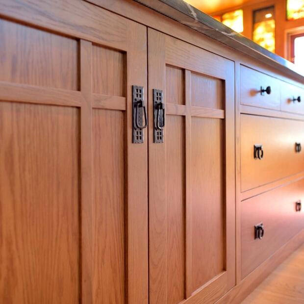 closeup of wooden kitchen cabinets with intricate detailing