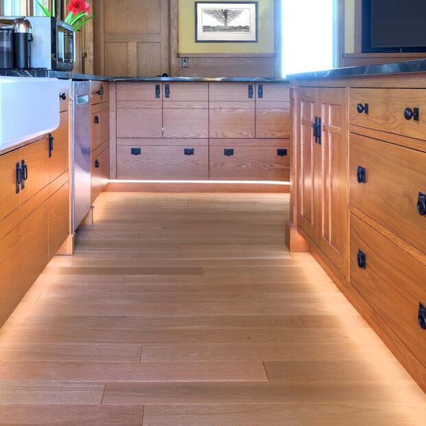 wooden floors and kitchen cabinetry